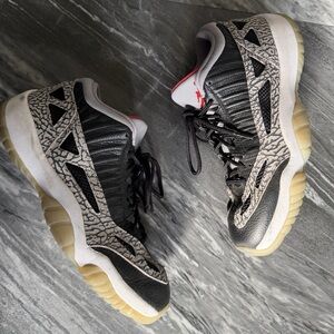 Nike Air Jordan 11 Retro IE Low Black Cement